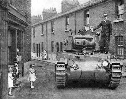 Mk 2 'Matilda' Tank being driven through Vulcan Village to the testing ground